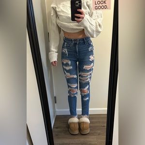 Dark washed ripped American Eagle Jeans. Size 00, but very stretchy